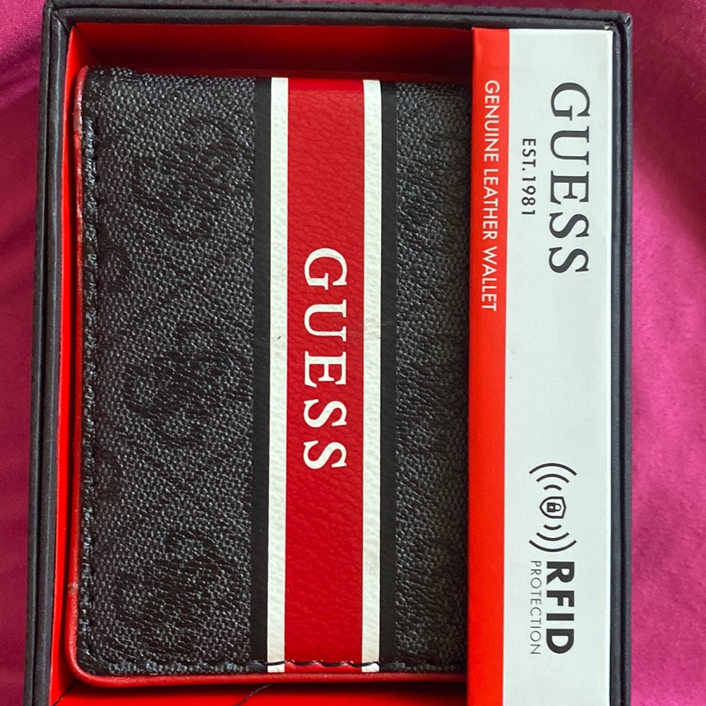 Guess genuine leather wallet with identifying theft and red white and black